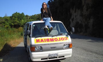 Silvia Rothlisberger sitting on her van on the roadside in New Zealand