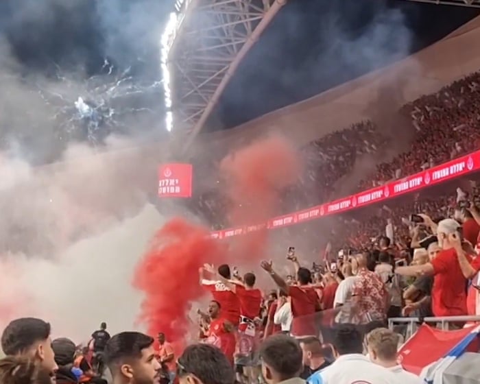 Tel Aviv football derby between Hapoel and Maccabi called off after rioting – video