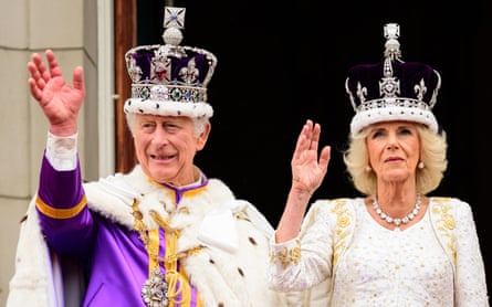 King Charles III and Queen Camilla on the balcony of Buckingham Palace after the coronation on 6 May 2023.