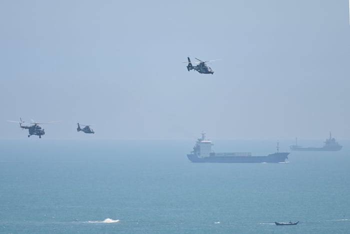 Chinese military helicopters seen as China launches massive military drills off Taiwan on Thursday.