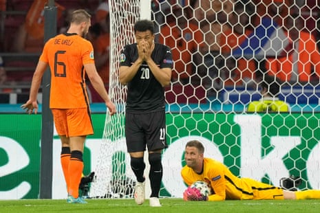 Netherlands’ goalkeeper Maarten Stekelenburg catches his headed effort.