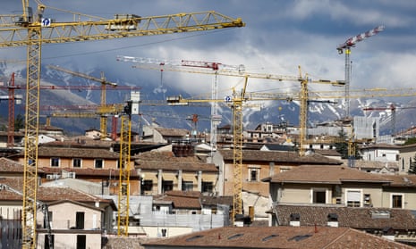Cranes still dominate the skyline of L’Aquila a decade after it was hit by a deadly earthquake.