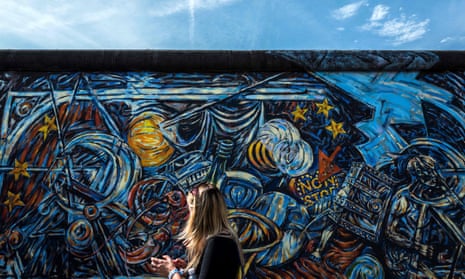 The East Side Gallery, a 0.8 miles (1.3km) stretch of the original Berlin Wall that remains as a monument.