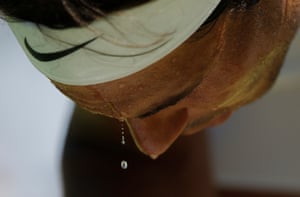 Sweat falls from Rafael Nadal's face at Wimbledon