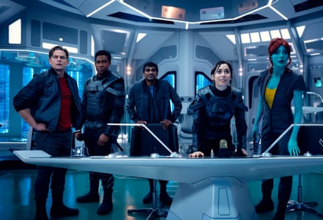 people standing in a Star Trek-like starship bridge