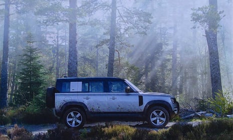 Advert showing Land Rover in forest