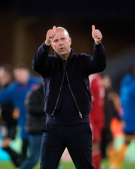 Arne Slot salutes the fans following the Emirates FA Cup fifth round match at Molineux