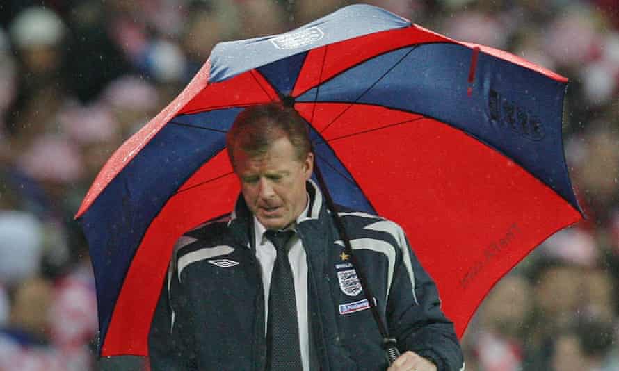Steve McClaren shelters from the Wembley rain during England’s defeat to Croatia in 2007.