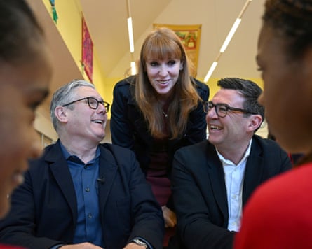 Angela Rayner, centre, with Starmer and Burnham at a school in Ashton, Greater Manchester on 11 May.