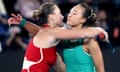 Zheng Qinwen (right) embraces Aryna Sabalenka after the Belarusian’s victory in the Australian Open final