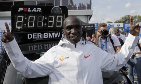 Eliud Kipchoge celebrates winning the 45th Berlin Marathon in world record time.