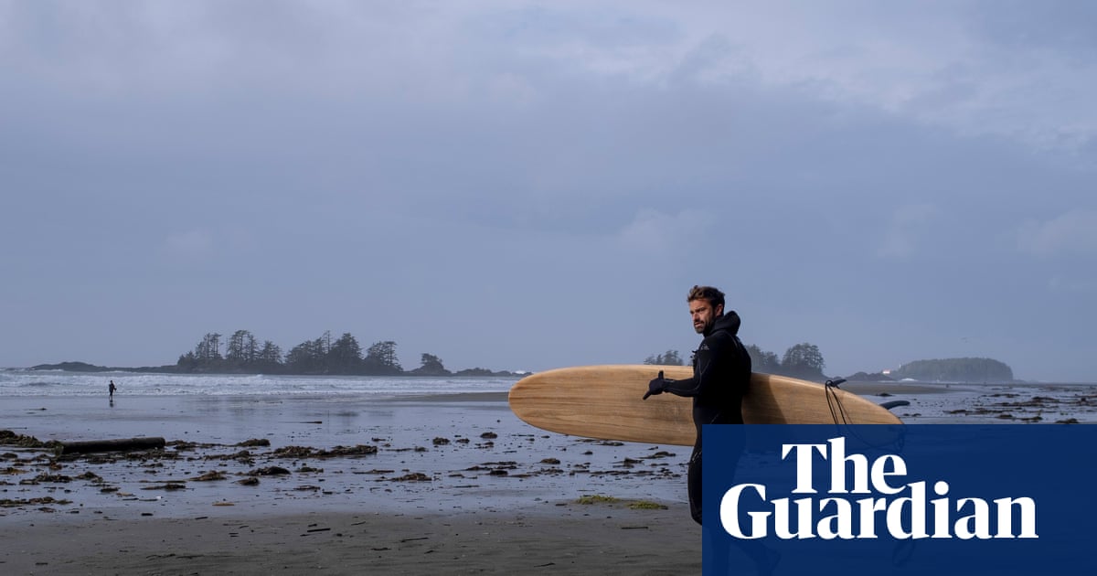 Waiting for the tsunami: its big waves are loved by surfers – but this Canadian town is braced for disaster