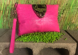 A bright pink cane toad purse from Vermin