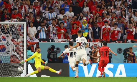 South Korea’s Hwang Hee-chan scores their second goal.