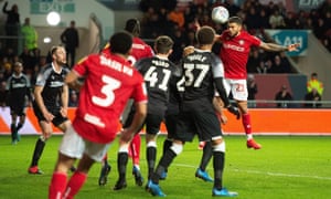 Nahki Wells heads home Bristol City’s opening goal.