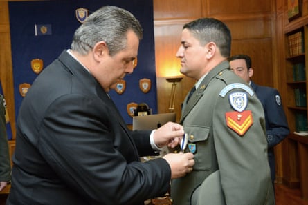 Greek army sergeant Antonis Deligiorgis is awarded the Cross of Excellency for his role in the rescue.