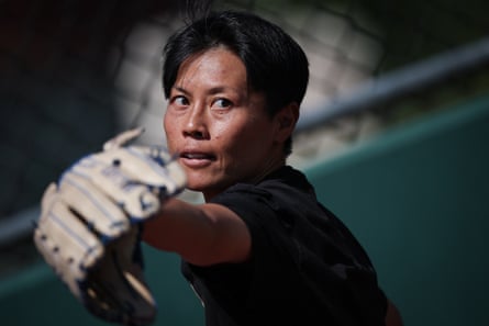 Ayami Sato pitches during tryouts for the Women’s Professional Baseball League at the Washington Nationals Youth Baseball Academy last August in Washington DC.