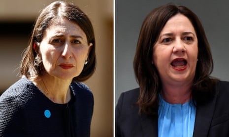 NSW premier Gladys Berejiklian (left) said her Queensland counterpart Annastacia Palaszczuk’s requirement that NSW record 28 days with no community transmission before reopening its borders was unreasonable.