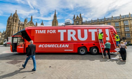 The vote leave battle bus rebranded by Greenpeace outside parliament.