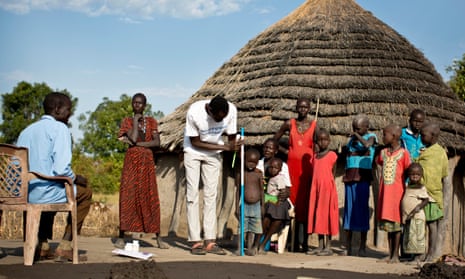 Unicef worker Daniel Madut screens children for signs of malnutrition in Angui, a village in Warrap state, South Sudan.