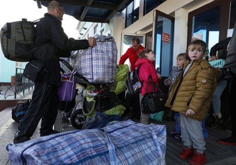Civilians from the Russian-controlled Kherson region of Ukraine arrive at a local railway station after what Russian-installed officials have described as an “evacuation”.