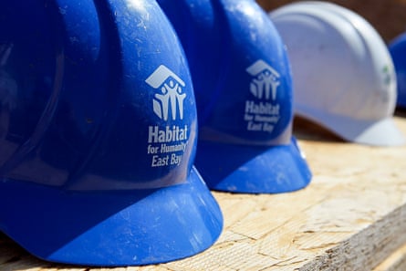 hard hats with a logo that reads “habitat for humanity”