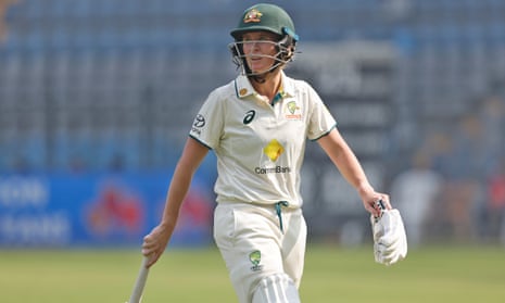 Beth Mooney walks from the field after being run out on day three of the women's Test between India and Australia