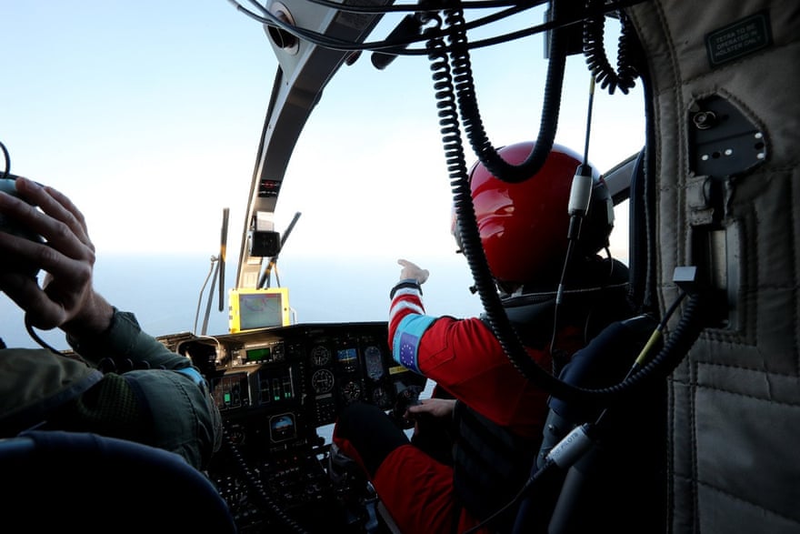 A Frontex air crew monitoring the sea for refugee and migrant crossings