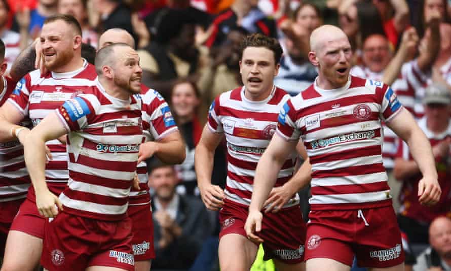 Liam Marshall (front, left) celebrating his attempt to win the game.