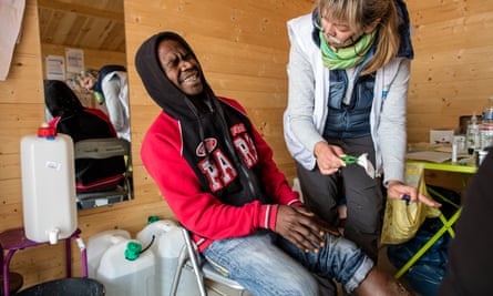 A patient in a clinic housed in a garden shed