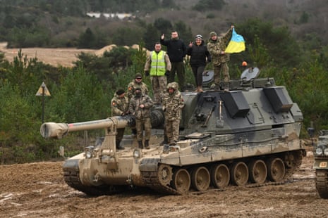 Ukrainian army volunteers receive Challenger tank training at a military base in southern England