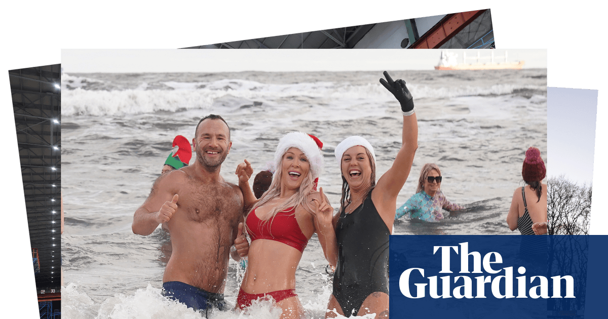 An icy vlogger and Boxing Day dips: photos of the day