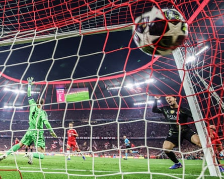 Goalkeeper Manuel Neuer of Bayern Munich concedes a goal by Ousmane Dembele of PSG