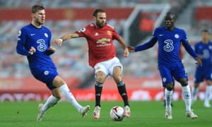 Juan Mata keeps hold of possession during Manchester United’s 0-0 draw with Chelsea at Old Trafford.