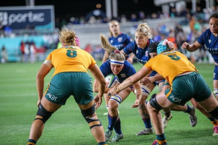Georgie Perris-Redding takes the ball into contact against Australia