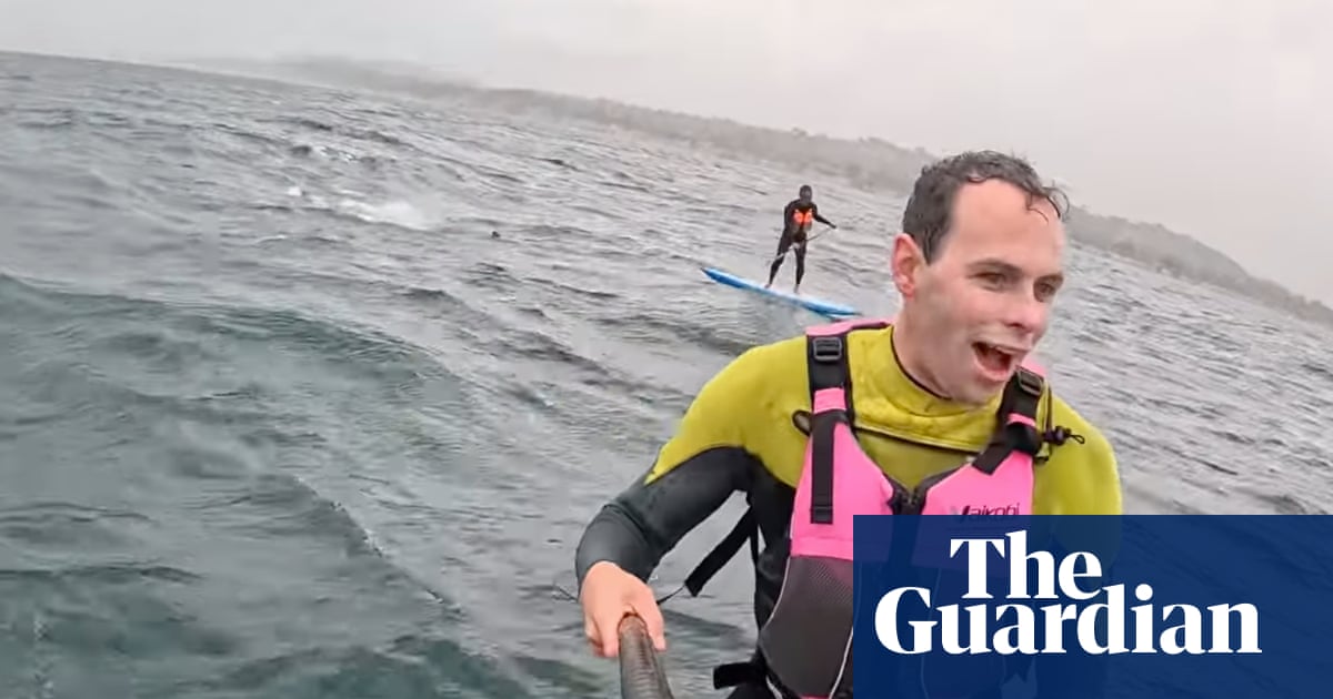 ‘Don’t fall!’: foil boarders describe hair-raising shark chase caught on video off California coast