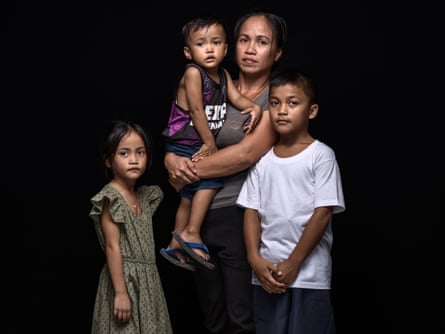 Joan Resuena with her children, Crystal Faye, Avie James and Mark