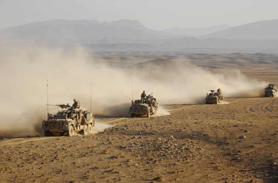 Australian Special Operations forces patrol in convoy in Oruzgan province