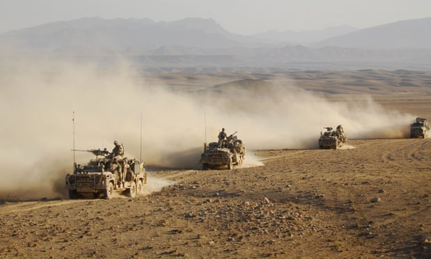 Soldiers from the Afghan national security forces and coalition forces conduct a counter-insurgency operation in Oruzgan Province, Afghanistan in 2009