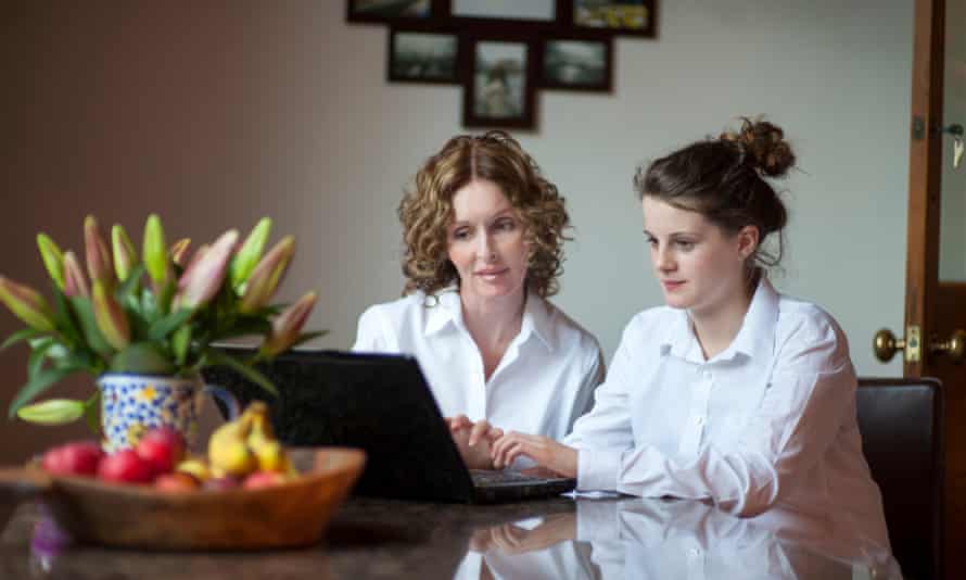 Mother and daughter using a laptop computer
