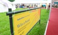 A promotional sign bearing Baillie Gifford's logo at the Hay festival.