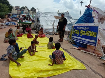 Students at a temporary outdoor learning center in Vijayawada, Andhra Pradesh.
