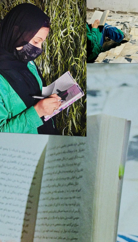 A young afghan woman writing in a notebook