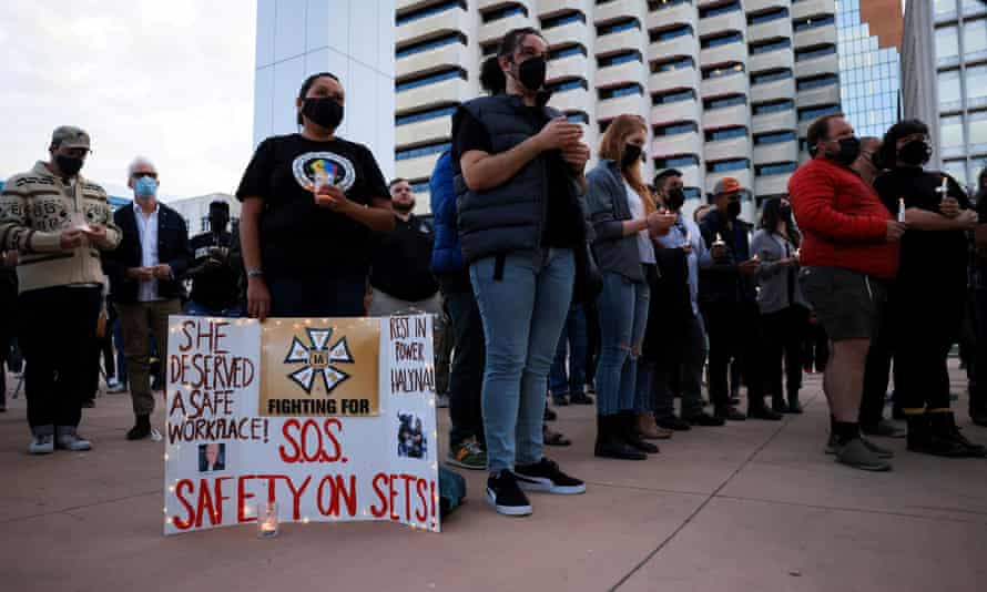 Protesters telephone for improved workplace information astatine a vigil for cinematographer Halyna Hutchins successful Albuquerque, New Mexico, connected Saturday.