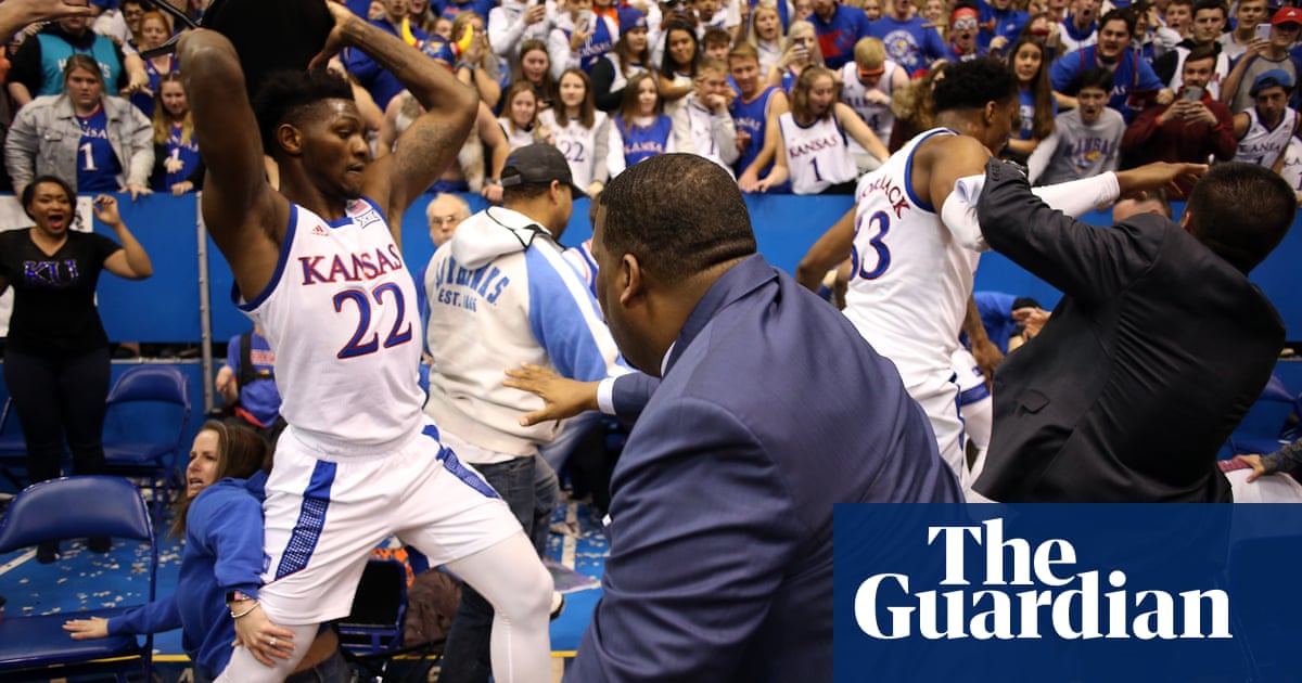 Brawl breaks out at the end of Kansas college basketball game – video report