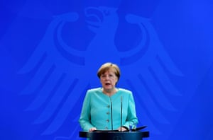 The German chancellor, Angela Merkel, addresses reporters after meeting with German parliamentary groups and ministers to discuss the Brexit result