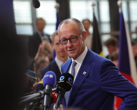 German chancellor Friedrich Merz speaks to the media as he arrives for a European Council summit in Brussels, Belgium.