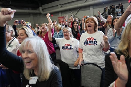 People cheer at rally
