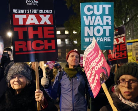Protesters demonstrated outside Downing Street last night ahead of Rachel Reeves’ budget today.
