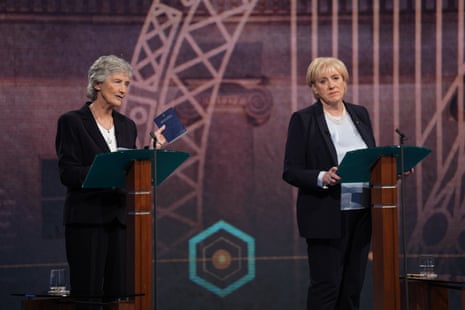 Independent candidate Catherine Connolly (left), holding a copy of the constitution of Ireland, and Fine Gael candidate Heather Humphreys take part in the final debate of the Irish presidential election campaign at the RTE studios in Donnybrook, Dublin.